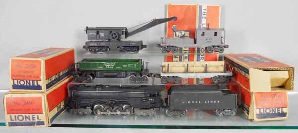 LIONEL TRAIN SET: O ga, 671 turbine loco, 671W tender, 3459 dump, 2411 lumber, 2460 crane, 2420 searchlight caboose, 5 orig boxes only, boxes rough, C6-7.