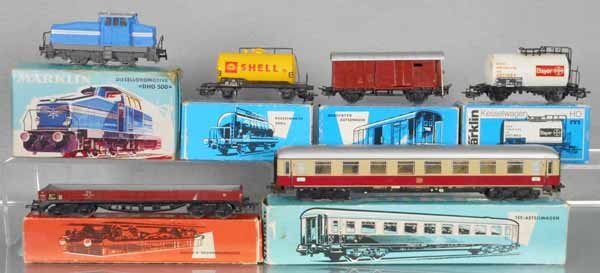MARKLIN TRAIN SET: HO ga, 3078 DHG500 diesel loco w/cars 4502, 4605, 4647, dirty, 4514, 1 set of wheels loose from truck, 4055, rust on couplers & steps, orig boxes minor wear to rough, C5-8.