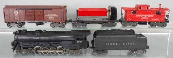 LIONEL TRAIN SET: O ga, 2020 loco, smoke bulb version, 2466WX tender, 2758 box car, 3559 dump car, 2457 caboose, cars have flying shoe trucks, C6-8.