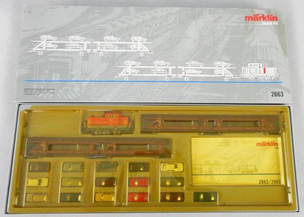 MARKLIN 2663 VOLKSWAGEN AUTO TRANSPORT SET: HO ga, VW diesel w/4 car carriers & 16 Herpa VW autos, carriers are missing 3 handrails total, orig box & insert, insert lid yellowed & cracked, C9.