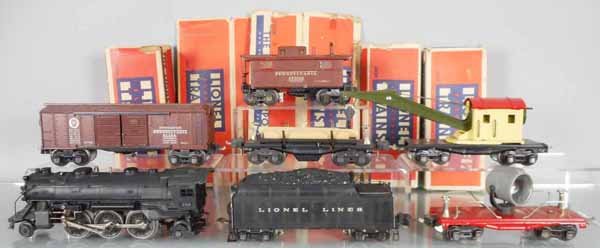 LIONEL TRAIN SET: O ga, 224 loco, 2224W tender, 2620 searchlight, 1 coupler incom, 2758 box car, 3651 lumber, 2660 crane, 2757 caboose, 5 orig boxes only, boxes rough, C6-7.