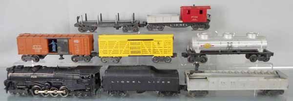 LIONEL TRAIN SET: O ga, 671 turbine loco, repainted, 2046W tender, 3562-25 barrel car, 3464 box car, 6656 stock car, 6415 tank, 3451 log dump, 6119 caboose, C5.