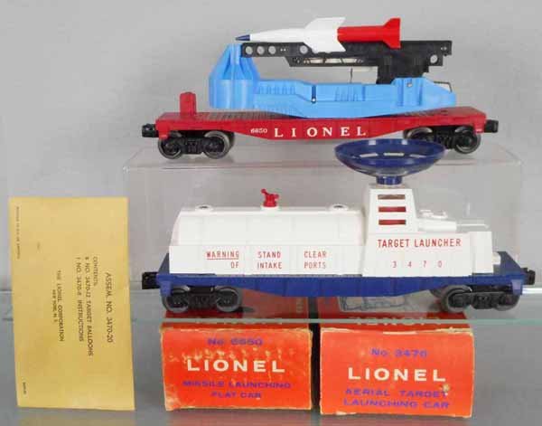 2 LIONEL FREIGHT CARS: O ga, 6650 missile launching flat, 3470 aerial target launching car, w/packet, orig boxes minor wear, C8.