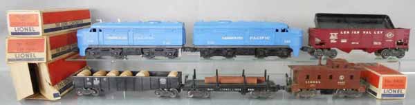 LIONEL TRAIN SET: O ga, 205 Missouri Pacific AA diesels, both plastic coupler bar supports broken, 6456 LV hopper, 6462 gondola w/barrels, 3461 log dump, 6457 caboose, 4 orig boxes only, boxes rough, C5-6.