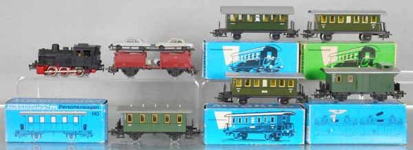 MARKLIN TRAIN SET: HO ga, 3029 tank loco, smokestack broken off, w/cars 4007, 4040, 4000, 4000, 4008, 315/4 auto transport, 5 orig boxes only, boxes minor wear, 3029 & 315/4 C5-6, rest C8-9.