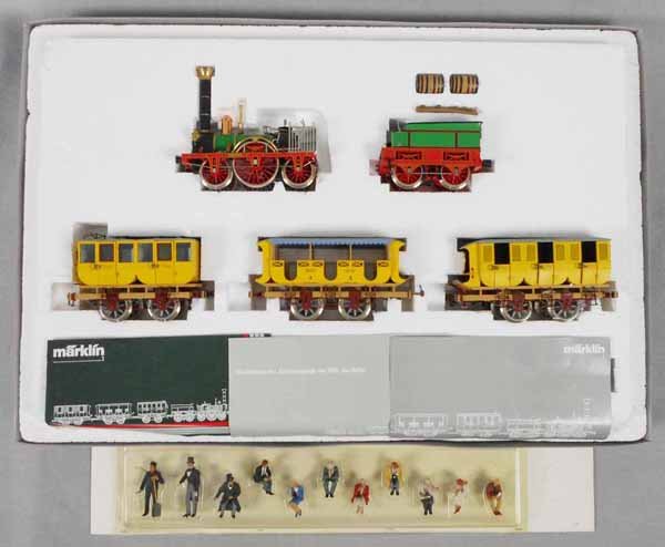 MARKLIN 5751 ADLER TRAIN SET: 1 ga, loco, tender & 3 coaches, w/11 piece figure set, orig boxes worn & taped, C8-9.