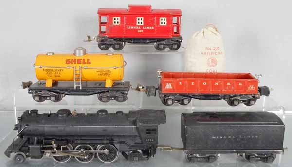 LIONEL TRAIN SET: O ga, 1666 loco, missing steps on cowcatcher, 1689W tender, 654 Shell tank, 652 gondola, 657 caboose, C5-6.