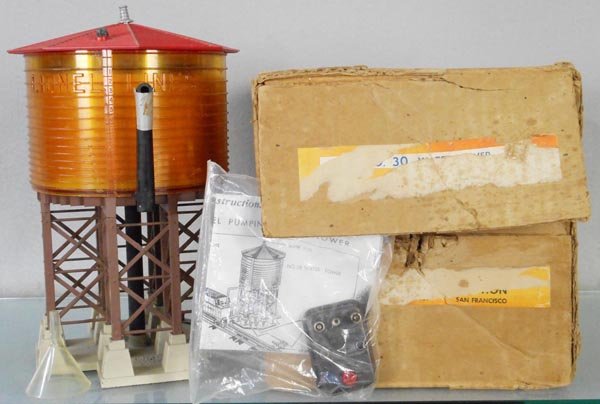 LIONEL 38 PUMPING WATER TOWER: O ga, motor looks clean, w/funnel & controller, orig box & inserts worn, C6.