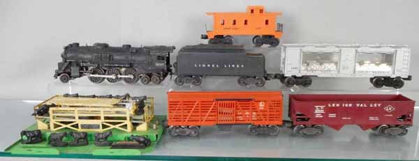 LIONEL TRAIN SET: O ga, 2037 loco, missing 2 jewels, 6466WX tender, 6445 Ft. Knox, 3656 cattle car & platform, 6456 LV hopper, 6057 caboose, C5.