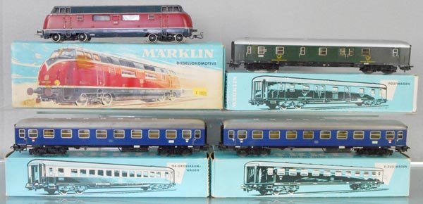 MARKLIN TRAIN SET: HO ga, 3021 diesel, 4047 baggage, roof worn, 4027 coach, 4086 coach, orig boxes minor wear, C5-6.