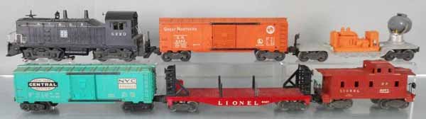LIONEL TRAIN SET: O ga, 6220 SF switcher, 6464-25 Great Northern box car, 3520 searchlight car, 6464-900 NYC box car, 6467 miscellaneous car, 6257 caboose, crack on 1 side, C5-6.