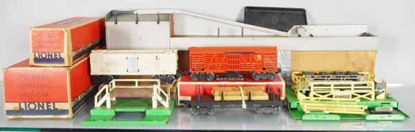 3 LIONEL ACCESSORIES: O ga, 3462 operating milk car & platform, 3656 cattle car & platform, 364 lumber loader w/3451 lumber car, orig boxes worn or rough, C5-6.