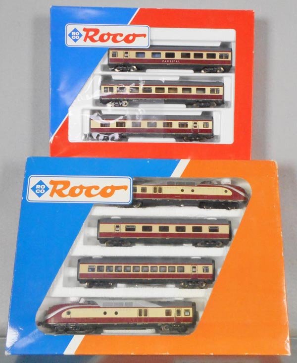 2 ROCO TEE SETS: HO ga, 2-rail, 43011 loco w/B unit & 2 coaches, w/43014 supplemental 3-car set, orig boxes & inserts, C9.
