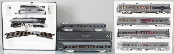 AMERICAN MODELS EMPIRE STATE EXPRESS: S ga, NYC DC loco w/chugger & smoke, w/4-car set & extra 2-car set, orig boxes & inserts, C9.