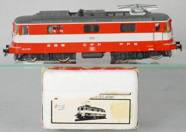 HAG 210 RE 4/4 SWISS EXPRESS ELECTRIC LOCO: HO ga, 3-rail, orange & white, orig box minor wear, C9.