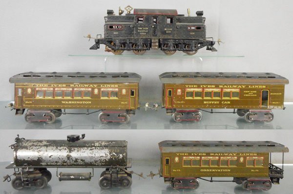IVES TRAIN SET: 1 ga, 3239 loco, gray, missing pantograph, 71 baggage, 72 Washington Pullman, 73 obsv, window inserts broken on 1 side, paint worn on roofs, 7849 Texas Oil tank, paint flaking, C3-5.