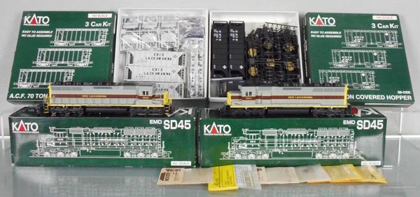 2 KATO TRAIN SETS: HO ga, 2-rail, 37-1705 & 37-1704 Erie Lackawanna diesels, w/2 unassembled 3-car kits, appear complete, orig boxes, C9-10.