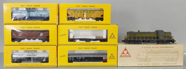 AMERICAN MODELS TRAIN SET: S ga, 1542 CN&J RS3 loco, 512 Domino tank, 3404 NH hopper, 505 Englehard tank, 3406 Peabody hopper, 6012 NH flat, 3404 NH hopper, orig boxes & inserts, C8-9.