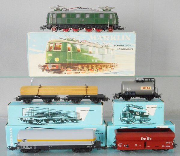 MARKLIN TRAIN SET: HO ga, 3023 electric loco, smudge on roof, w/cars 4512, 4645, 4628, 4624, orig boxes minor wear, loco box worn, C8-9.