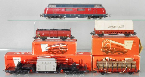 MARKLIN TRAIN SET: HO ga, 3021 diesel w/freight cars 4604, slight warp, 313/3, 4617, 4608, slight warp, orig car boxes only, 3 have minor wear, 1 rough, C7-9.