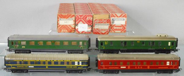 4 MARKLIN COACHES: HO ga, 346/1 coach, 346/4 baggage, 346/3J sleeper, 346/3 coach, orig boxes some wear to worn, C6-8.