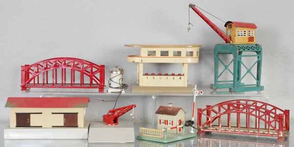 8 MARKLIN ACCESSORIES: HO ga, 2 #467 bridges, 430 ringing bell, 464 gantry crane, w/reproduction roof, missing smokestack, 473/6 station, 428/429 freight shed & crane, restored, 455 gate house w/semaphore, C5-8.