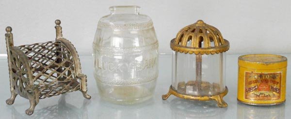 4 STILL BANKS: painted cast iron, Arcade Cash Register, 3 3/4” tall, Crystal, 3 7/8” tall, w/glass, Lucky Bank, 4 1/4” tall, tin Patton Paints, 2” tall, C5-6.