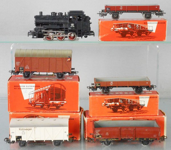 MARKLIN TRAIN SET: HO ga, 3000 tank loco, orig box bottom only, box worn, w/cars 2 #4503, 4508, 4506, 4602, warped, faded & mildewed, rest of cars have minor wear, orig car boxes minor to some wear, C4-7.