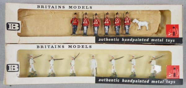 2 BRITAINS SETS: 9158 Ft. Henry Guards, 7 pcs, some paint wear, orig box & insert worn, window loose, C5, 9184 USA Sailors, 7 pcs, orig box & insert worn, C8.