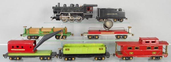 AMERICAN FLYER TRAIN SET: O ga, 429 loco & tender, both are old restorations, 406 lumber, 415 searchlight, 3025 crane, 409 dump, 411 caboose, caboose is restored, C5-6.