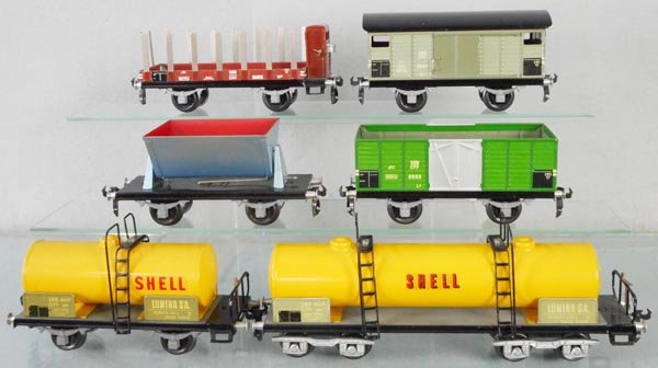 6 BUCO FREIGHT CARS: O ga, 8665 stake flat, 8644 box car, 8678 dump car, 8660 gondola, 8658 tank car, 8635 tank car, C7-8.