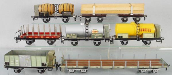 7 BUCO FREIGHT CARS: O ga, 8669 barrel, 8668 lumber, 8665 flat w/stakes, 8656 & 8658 tank cars, 8661 gondola, 8630 long flat, C7-8.