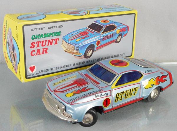 KUO HSUN CHAMPION STUNT CAR: Taiwan, litho tin, battery operated, working, 10 1/2” long, orig box, C8.