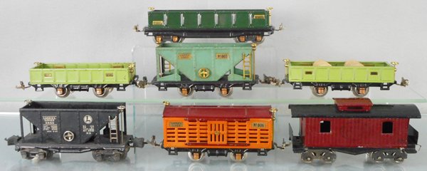 7 LIONEL CARS: O ga, 812 gondola, 2 #902 gondolas, 803 hopper, 2653 hopper, 806 stock, 822 caboose, C5-7.