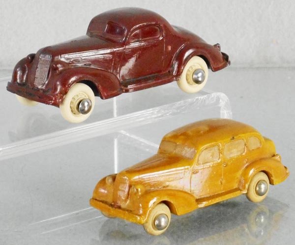 2 RAINBOW RUBBER OLDSMOBILES (1 of 1)