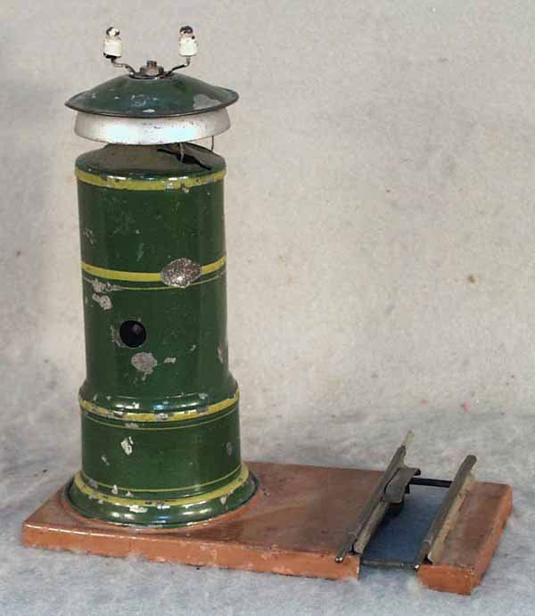 MARKLIN 2254 WARNING BELL: handpainted tin, clockwork, working, 1 dent on side, some paint flaking, base repainted, adjustable for all gauges, 8" tall, C4-5. Complete information covering terms, conditions, payment and shipping