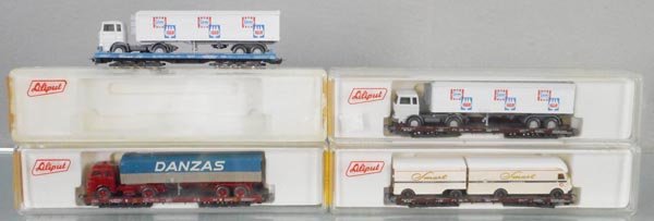 4 LILIPUT FLAT CARS W/WIKING LOADS (1 of 1)