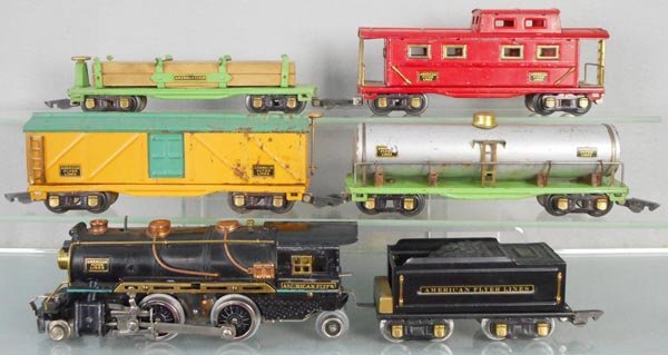 AMERICAN FLYER TRAIN SET: O ga, 3310 loco, 3199 tender, 410 tank car, 408 box car, some oxidation spots, 406 lumber car, 411 caboose, some touch up, C5-7.
