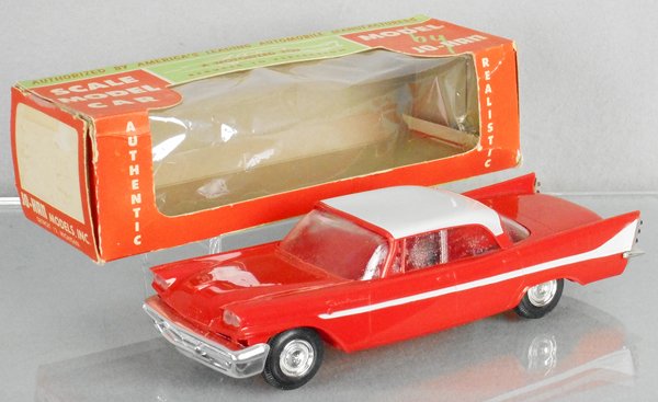JOHAN 1958 DESOTO FIREFLITE PROMO: orange & white w/frosted windows, friction works sluggishly, body warp, orig box minor wear, C8-9.