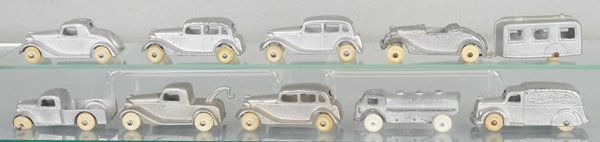 10 TOOTSIETOY SILVERTOYS: 3 #111 Ford Sedans, 112 Ford Coupe, 113 Wrecker, 116 Roadster, 120 Oil Truck, 121 Pick Up, 123 Delivery, 1043 Trailer, C5-7.