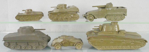 6 DALE ARMY TOYS: slush die cast, German Tank, 4 1/2 in long, Stuart Tank, 4 3/4 in long, Half Track, 6 1/2 in long, US Tank, 6 1/2 in long, gun barrel glued, German Scout Car, 4 1/2 in long, German Tank, 8 in long, C6