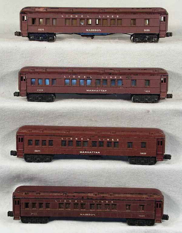 4 LIONEL MADISON CARS: O ga, 2623 Manhattan, 2 #2625 Madison coaches, 2628 Manhattan, 1 long scratch on side, cars have serious playwear & scratches, some plastic window inserts are cracked & incom, all steps intact, C4. Co