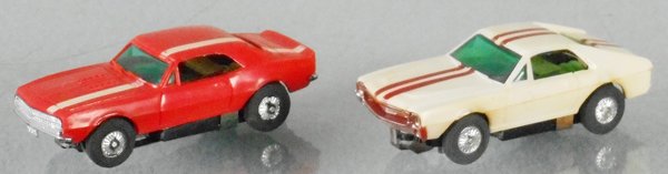 2 TYCO SLOT CARS: 2 TYCO SLOT CARS used, AMX, white, missing 1 pick up, Chevy Camaro, orange, C7-8.