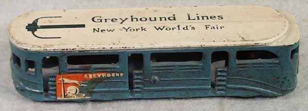 033: ARCADE NY WORLDS FAIR BUS: painted cast iron, some decal chips 6.5" long, from New York World¹s Fair, C6. Complete information covering terms, conditions, payment and shipping is listed below. Please read and understand the in