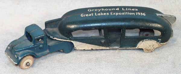 ARCADE 1936 GREYHOUND LINES BUS: from 1936 Great Lakes Exposition, painted cast iron, 6.75" long, C6-7. Complete information covering terms, conditions, payment and shipping is listed below. Please read and understand the information
