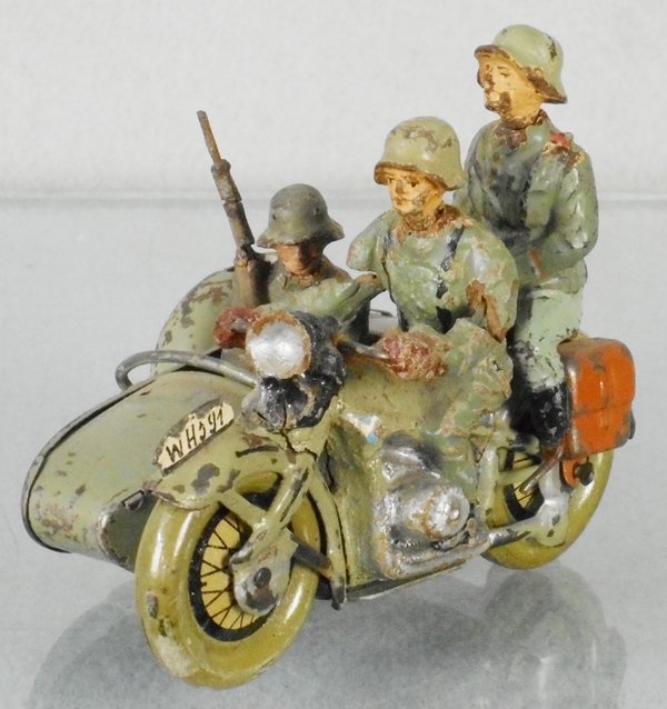 LINEOL WH591 MOTORCYCLE & SIDECAR: handpainted tin, 4 in long, all figures have cracks, two figures incom, C5.