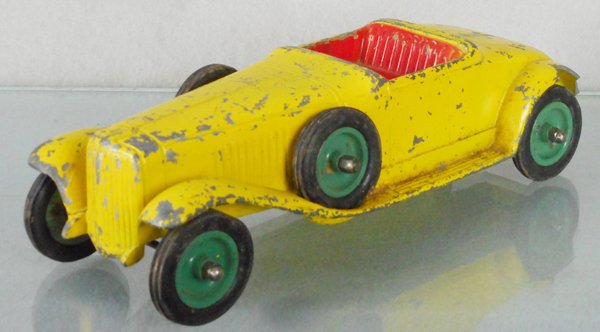 FAITH ROADSTER: die cast, 10 1/2 in long, w/cracks & pieces missing from rear fenders, missing steering wheel, C2-3.