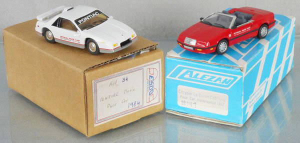 2 PACE CAR MODELS: resin, Esdo #34 1984 Pontiac Fiero GT, Alezan #147 1987 Chrysler Le Baron Cabriolet, orig boxes, C9.