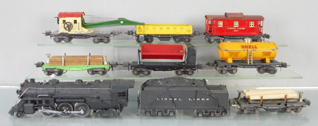 LIONEL TRAIN SET: O ga, 226 loco, 2226WX tender, 3 repaired cracks on 1 side, 3651 lumber dump, 2651 lumber flat, 3559 coal dump, restored, 2654 Shell tank, 2560 crane, chassis restored, 3652 automated gondola, 2657 ca