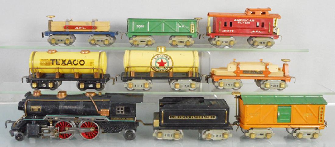 AMERICAN FLYER TRAIN SET: O ga, 3315 loco, repainted, 3199 tender, 3015 box car, 231 Texaco tank, 3018 Air Service tank, 3046 lumber flat, 3046 lumber flat 3016 gondola w/barrels, 3017 caboose, C6-7.